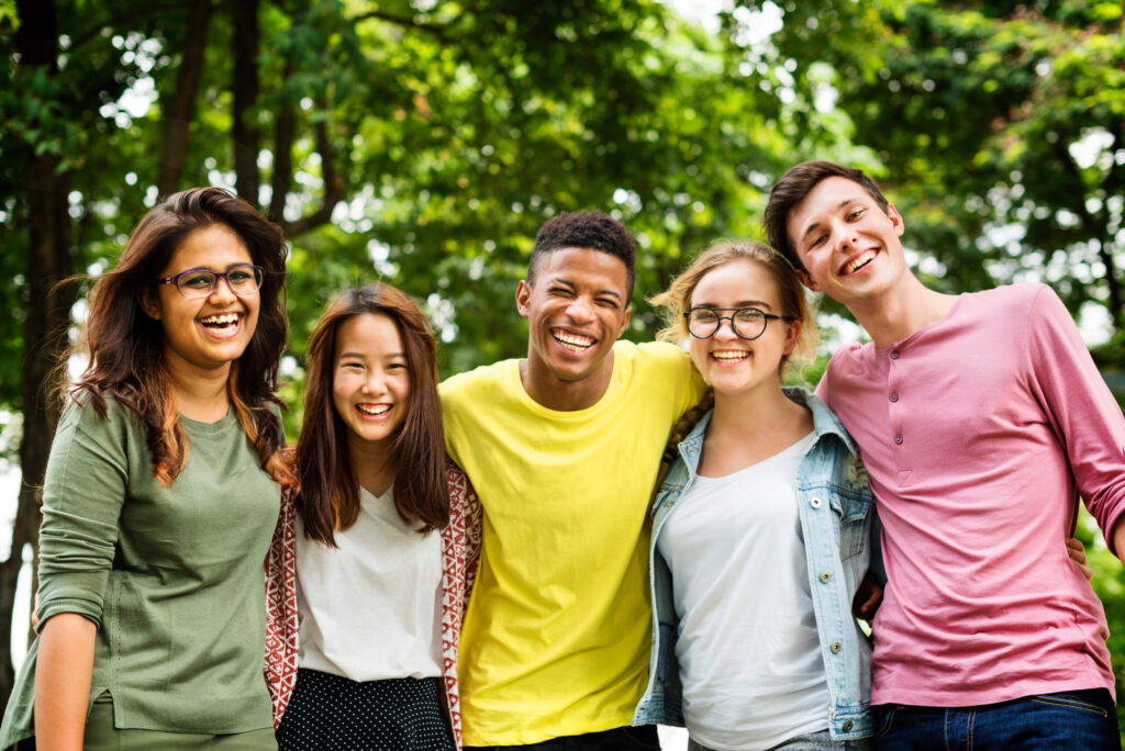 group of smiling teens